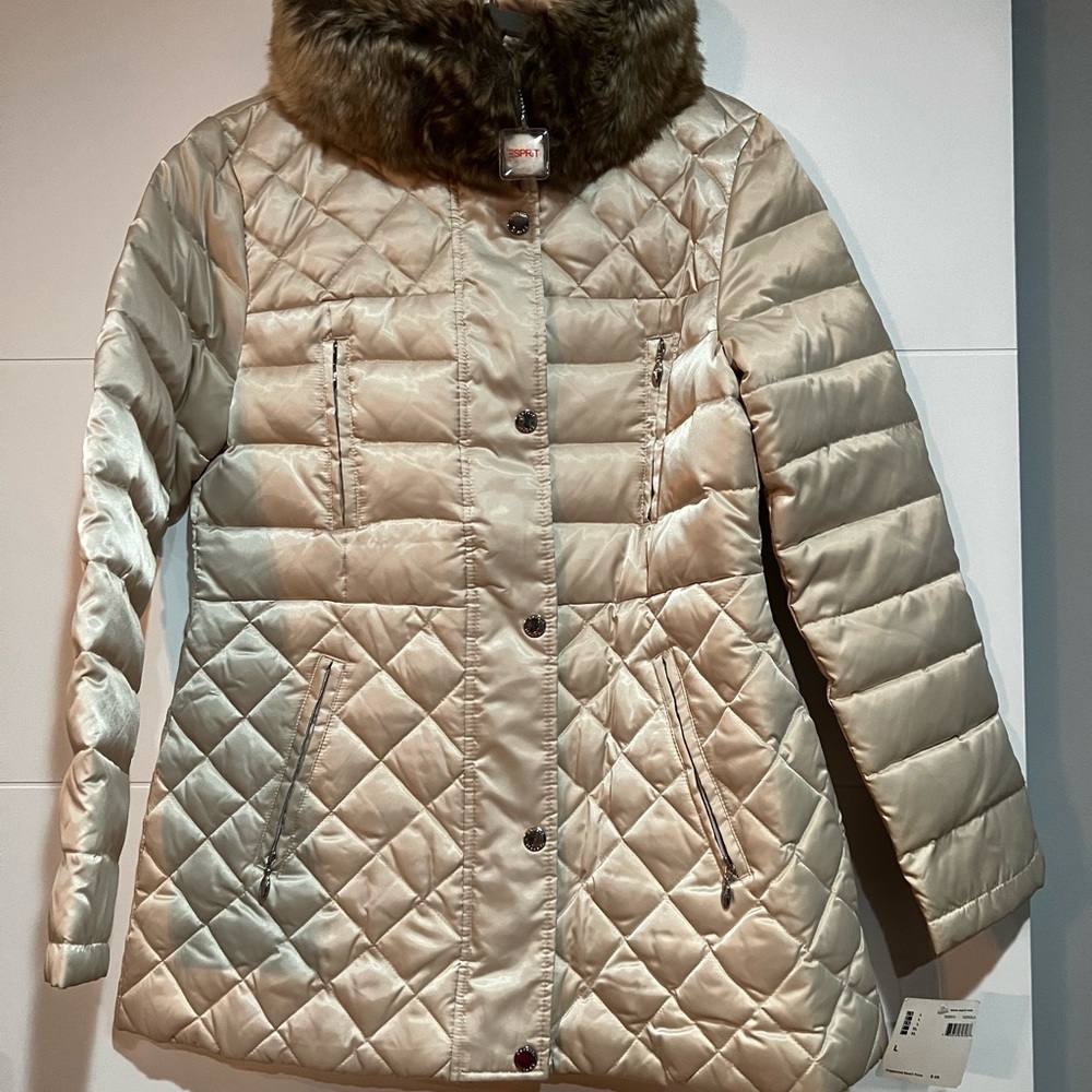 A Cream color 50% down light weight Coat..